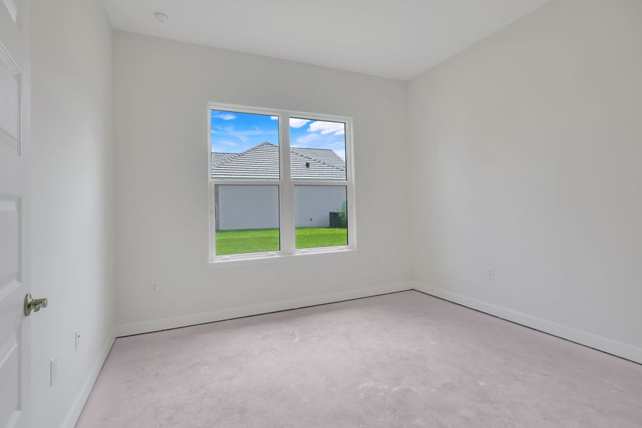 Representative unfurnished interior of a home built from the The Courtyard Junior by ABD Development in Toscana, Palm Coast (Image 32).