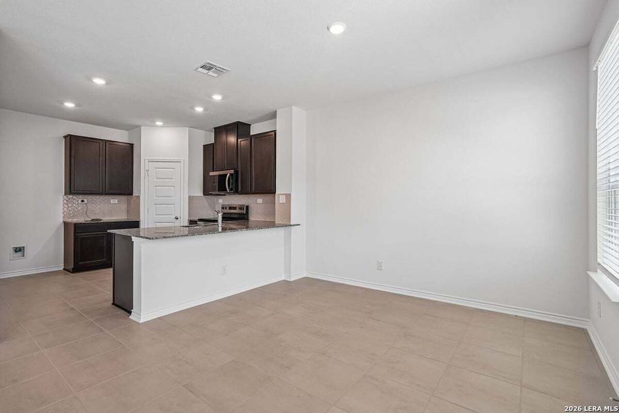 Furnished interior view inside a new home in Medina Crossing, Von Ormy (Image 6).