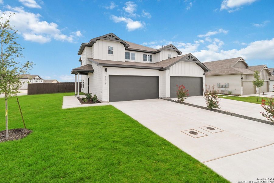 Front exterior of a new home in , Converse, TX, highlighting curb appeal (Image 1).