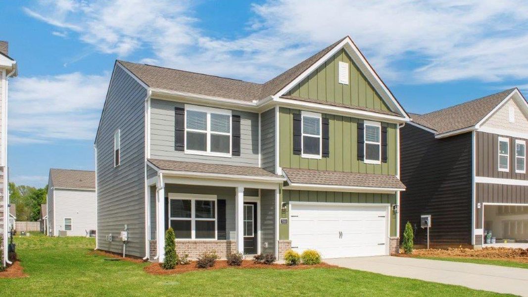 Front exterior of a new home in The Cove at Thrasher Landing, Hixson, TN, highlighting curb appeal (Image 2).
