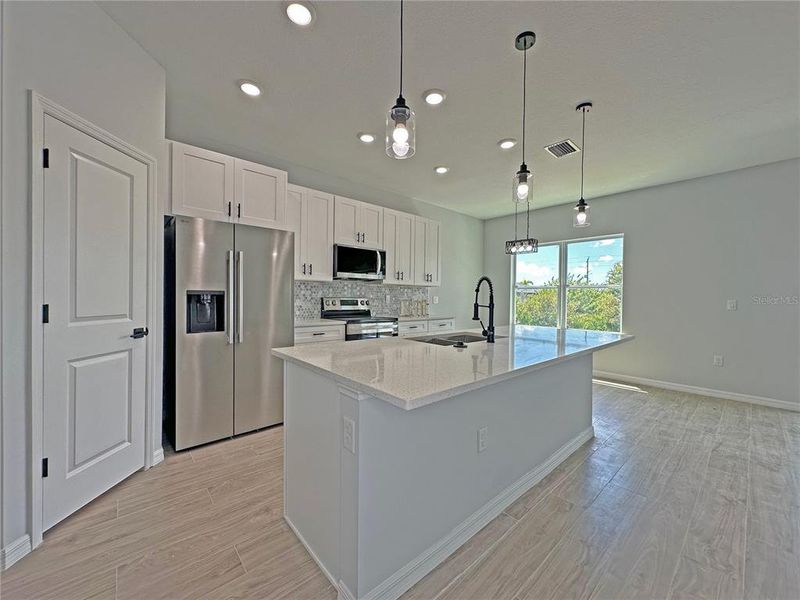 Furnished interior view inside a new home in , Port Charlotte (Image 6).