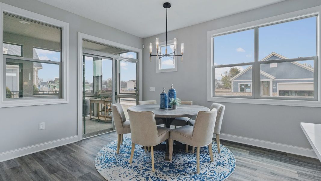 Representative furnished interior of a home built from the Cambridge by Epcon Communities in The Courtyards at Oak Grove, Durham (Image 14).