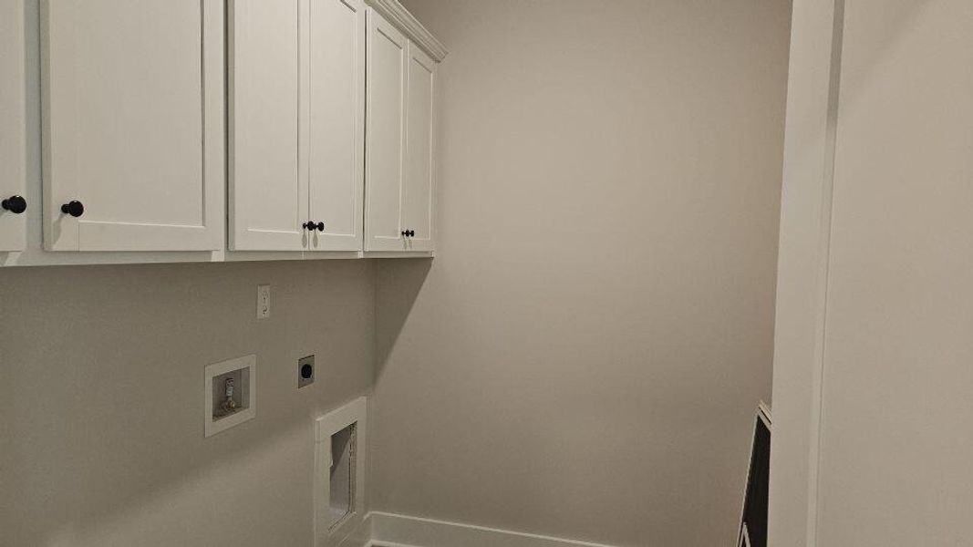 Spacious, unfurnished interior of a new home in The Enclave at French Quarter Creek, Huger (Image 14).