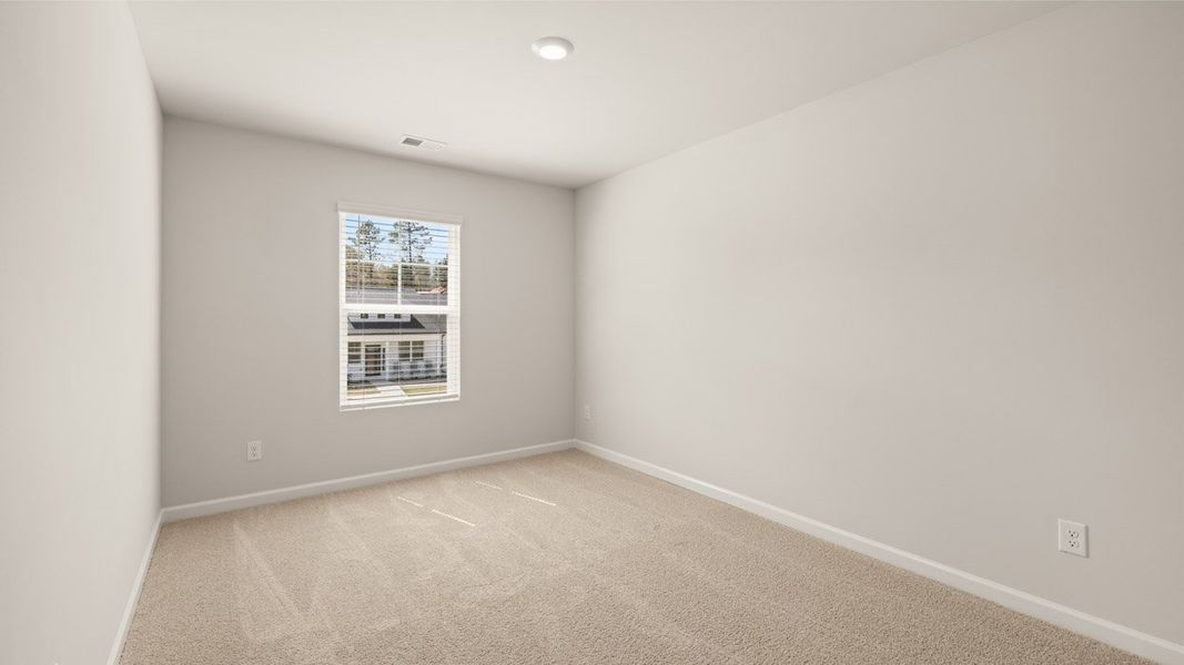 Spacious, unfurnished interior of a new home in Byrd Village, Graniteville (Image 22).