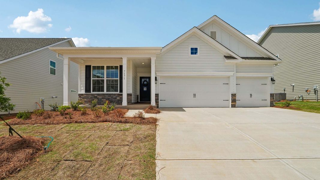 Front exterior of a new home in Sylvan Creek, Denver, NC, highlighting curb appeal (Image 1). Front exterior of a new home in Sylvan Creek, Denver, NC, highlighting curb appeal (Image 1).