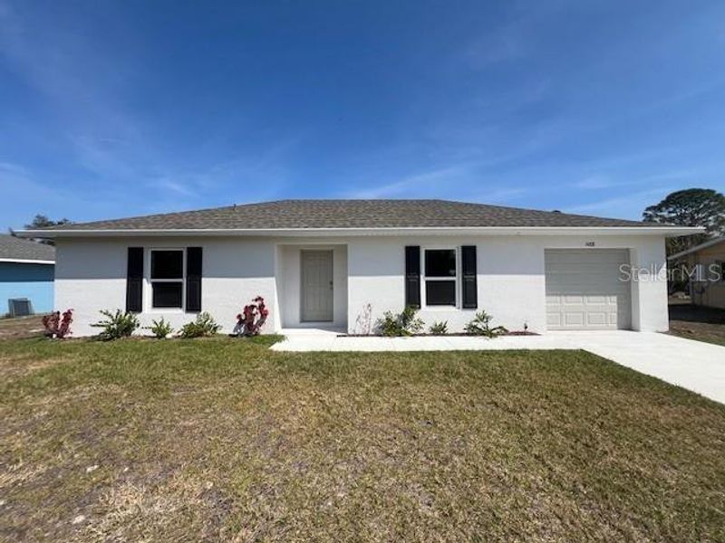 Exterior details and patio area of a home in Port Charlotte, Port Charlotte (Image 1). Exterior details and patio area of a home in Port Charlotte, Port Charlotte (Image 1).