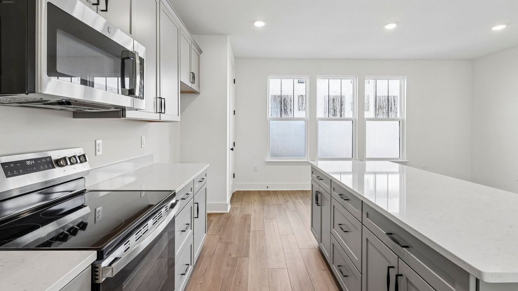Furnished interior view inside a new home in Parkview at Hamlin, Winter Garden (Image 15).