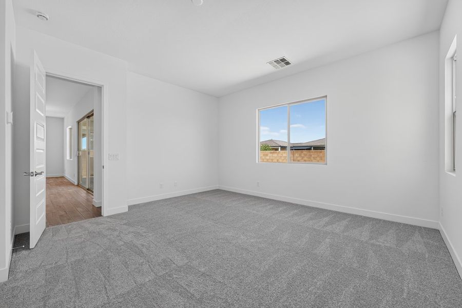 Spacious, unfurnished interior of a new home in Combs Ranch, San Tan Valley (Image 18).