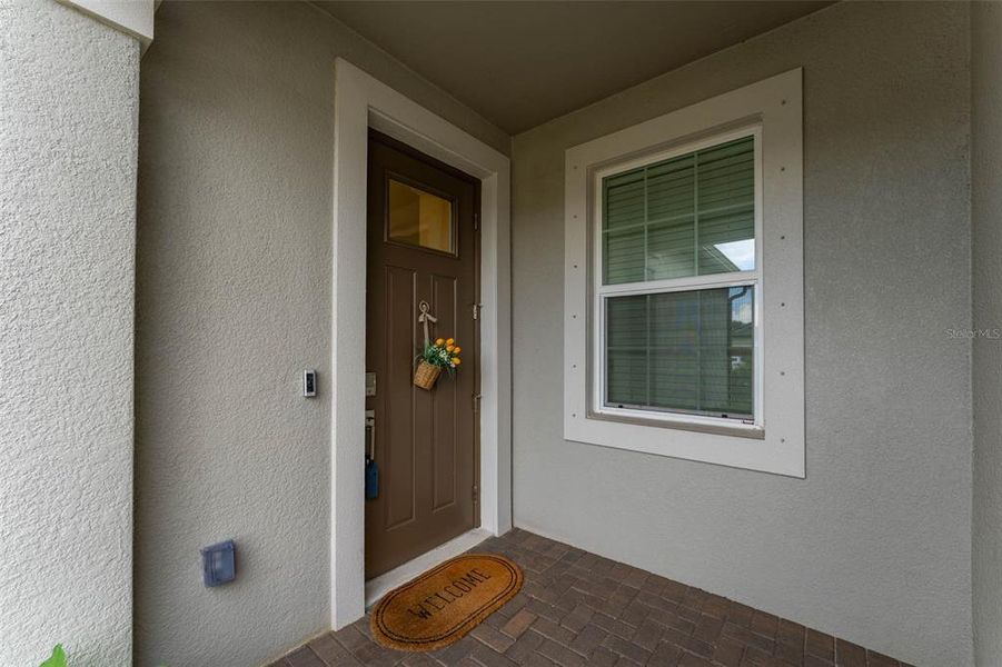 Exterior details and patio area of a home in Prosperity Lakes Active Adult, Parrish (Image 4).