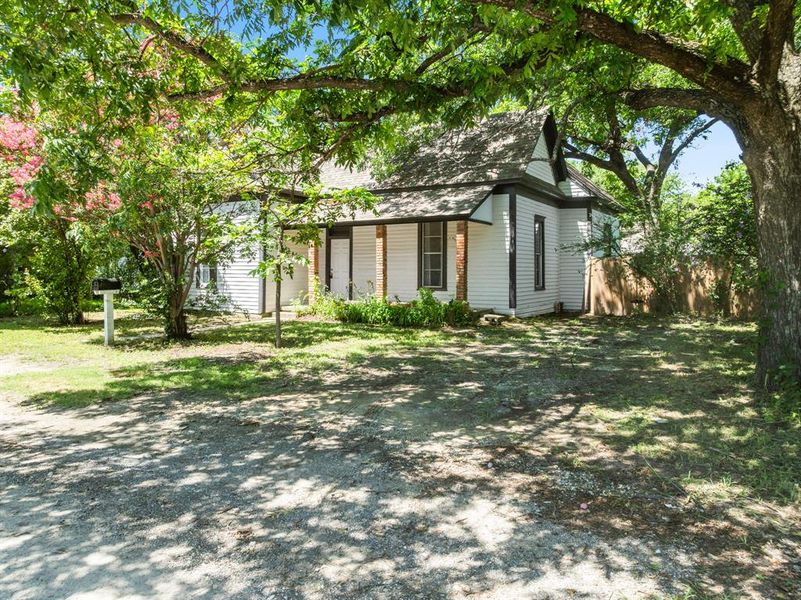 Front exterior of a new home in , Hillsboro, TX, highlighting curb appeal (Image 14). Front exterior of a new home in , Hillsboro, TX, highlighting curb appeal (Image 14).