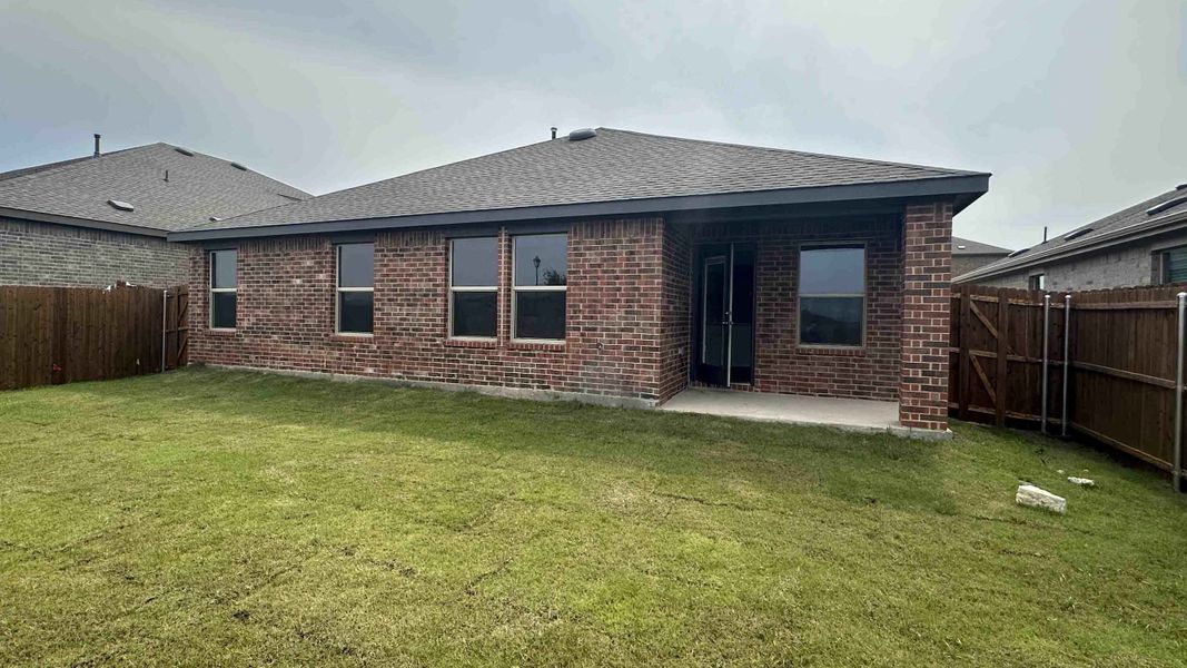 Exterior details and patio area of a home in Cartwright Ranch, Crandall (Image 3).