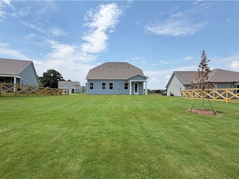 Exterior details and patio area of a home in Wehunt Meadows, Hoschton (Image 22).
