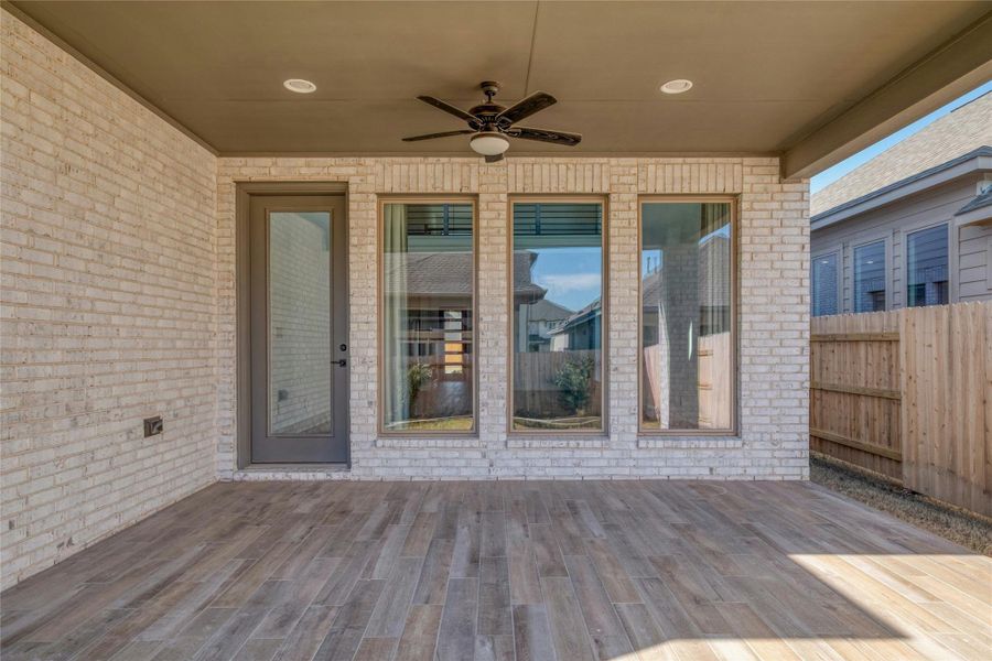 Exterior details and patio area of a home in Lariat 45', Liberty Hill (Image 3).
