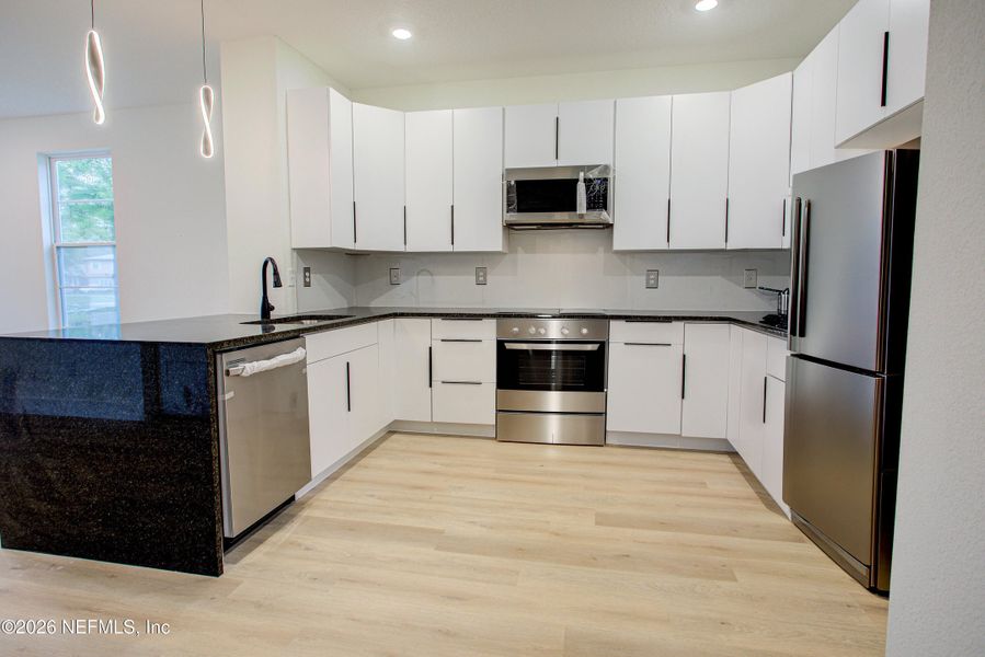 Furnished interior view inside a new home in , Jacksonville (Image 4). Furnished interior view inside a new home in , Jacksonville (Image 4).