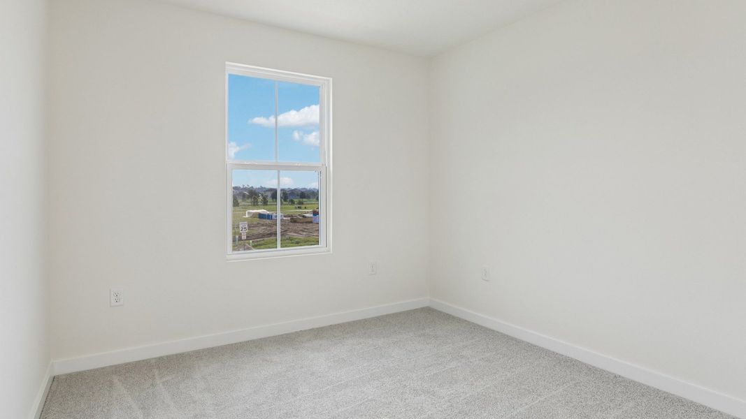 Furnished interior view inside a new home in Cyrene at Harmony, St. Cloud (Image 15).
