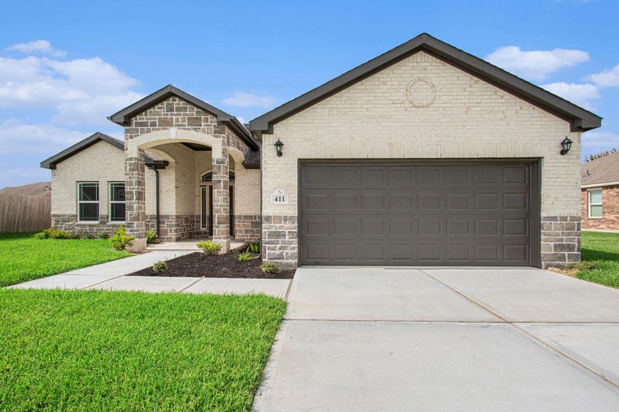 Front exterior of a new home in Columbia Lakes, West Columbia, TX, highlighting curb appeal (Image 2). Front exterior of a new home in Columbia Lakes, West Columbia, TX, highlighting curb appeal (Image 2).