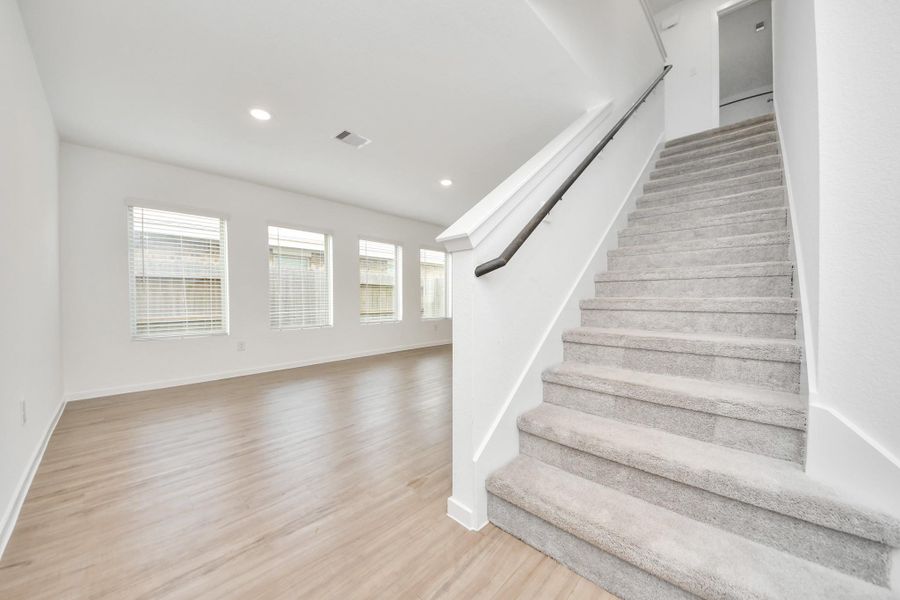 Open concept living area filled with natural light.