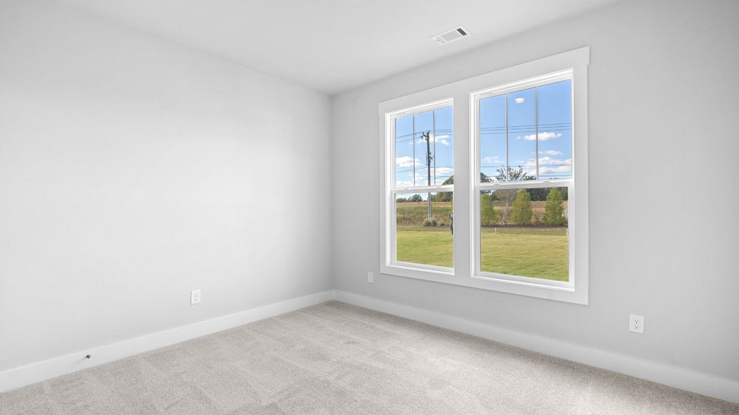 2 story single family home, all white, bedroom