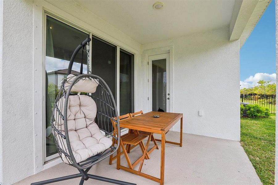 Exterior details and patio area of a home in Waterset Garden Series, Apollo Beach (Image 4).