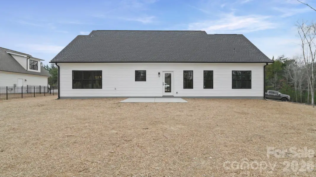 Exterior details and patio area of a home in , Oakboro (Image 16).