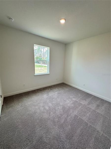 Spacious, unfurnished interior of a new home in Palm Coast: Cornerstone Collection, Palm Coast (Image 9).