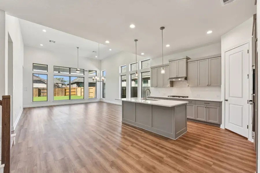 Furnished interior view inside a new home in 6 Creeks, Kyle (Image 3).