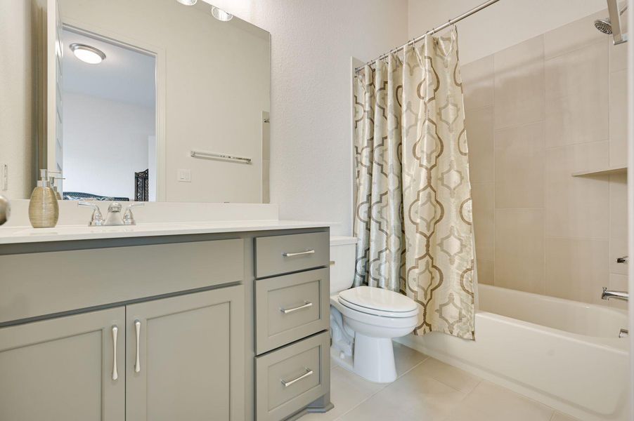 One of the two guest bathrooms.