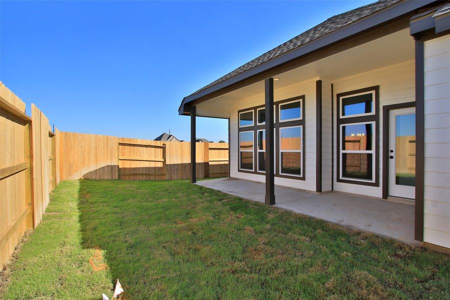 Exterior details and patio area of a home in Oakwood Estates, Waller (Image 20).