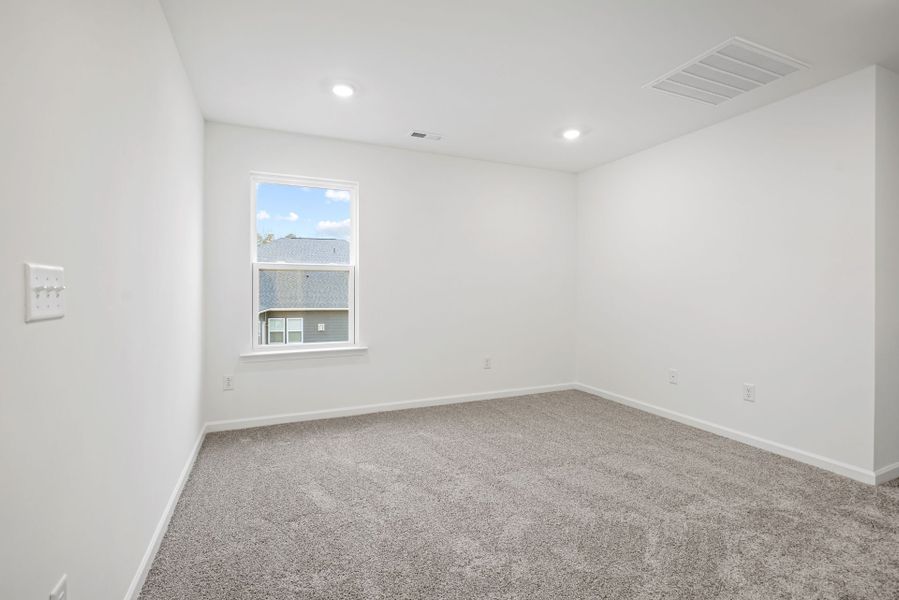 Spacious, unfurnished interior of a new home in Bryton, Huntersville (Image 43).