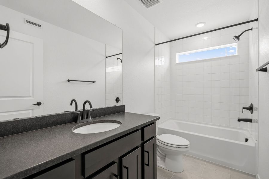 Furnished interior view inside a new home in Harvest Crossing, Aurora (Image 10).