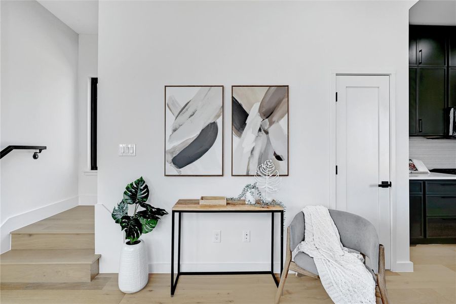 Sitting room featuring light wood-type flooring