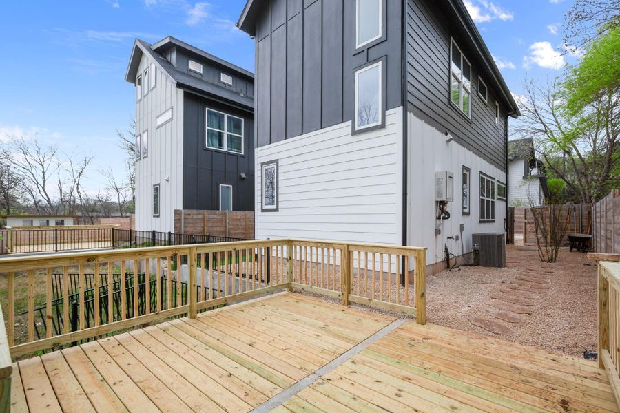 Deck with a fenced backyard