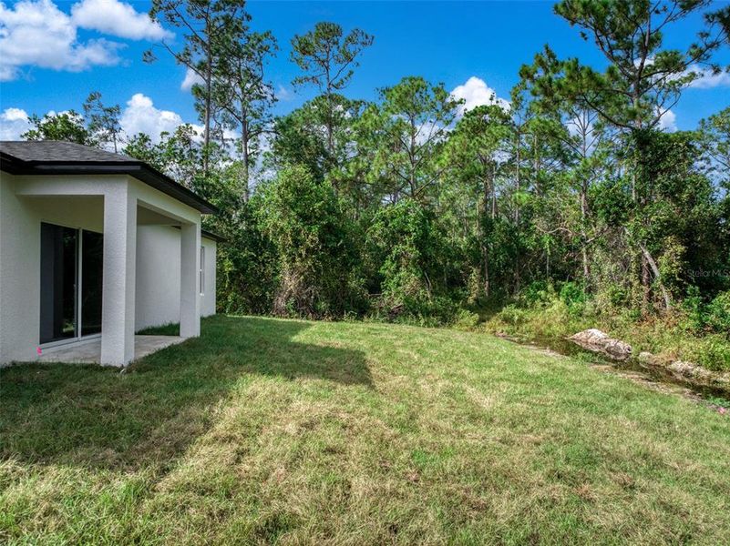 Exterior details and patio area of a home in , Sebring (Image 3).