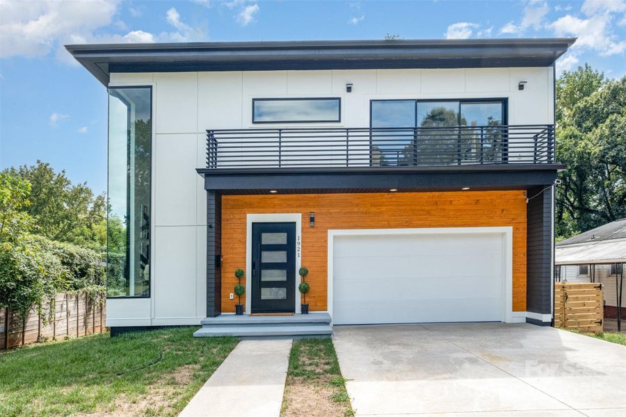 Front exterior of a new home in , Charlotte, NC, highlighting curb appeal (Image 2).