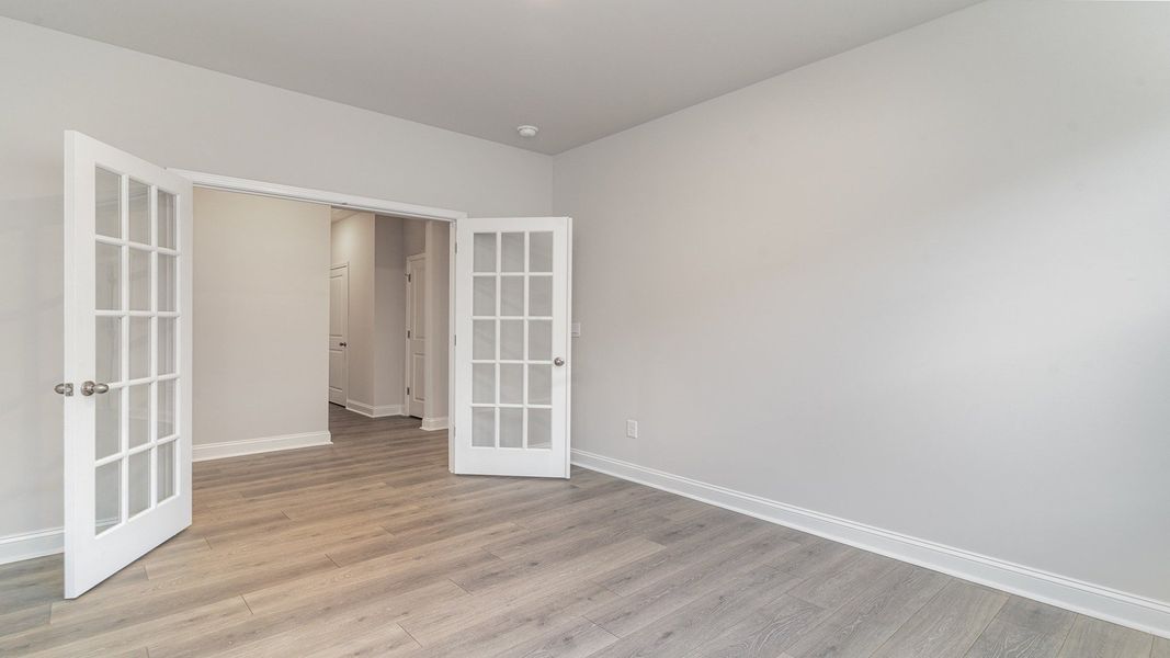 Representative unfurnished interior of a home built from the DARBY by D.R. Horton in Spring View Landing, Loris (Image 12).
