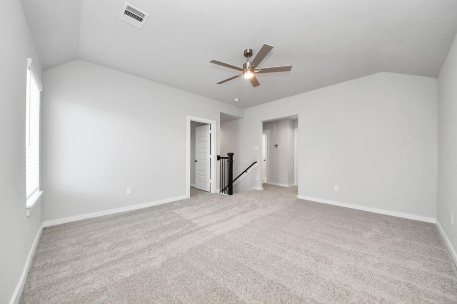 Ascend to relaxation in this fantastic game room! Ideal for both casual gatherings and adult gaming, it boasts plush carpet, lofty ceilings, custom paint, and ample windows for abundant natural light. Sample photo of completed home with similar floor plan. Actual colors and selections may vary. Ascend to relaxation in this fantastic game room! Ideal for both casual gatherings and adult gaming, it boasts plush carpet, lofty ceilings, custom paint, and ample windows for abundant natural light. Sample photo of completed home with similar floor plan. Actual colors and selections may vary.