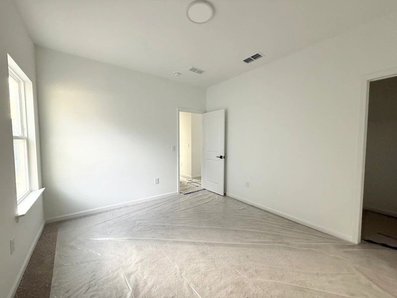 Bedroom 2 featuring AW Collection® Oxford - Natural tones and timeless comfort.