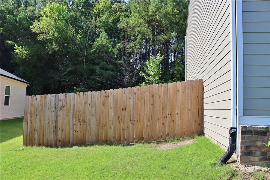 Front exterior of a new home in , Atlanta, GA, highlighting curb appeal (Image 1).