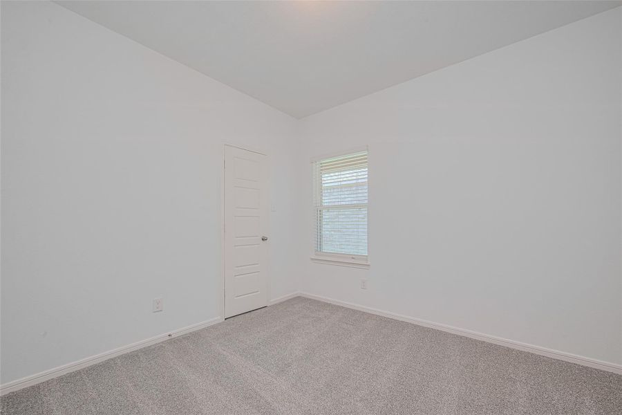 Spacious, unfurnished interior of a new home in Sunterra, Katy (Image 26).