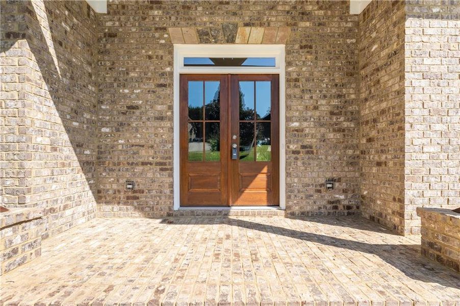 Front exterior of a new home in , Suwanee, GA, highlighting curb appeal (Image 2).