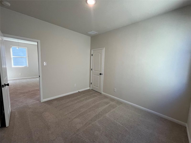 Spacious, unfurnished interior of a new home in The Cottages at Lariat, Liberty Hill (Image 19).