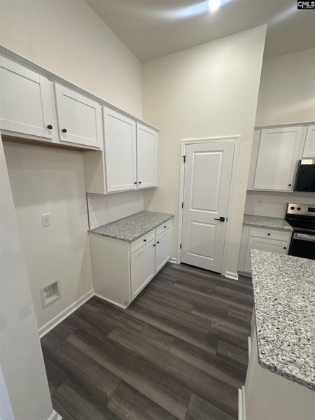Furnished interior view inside a new home in Piney Woods Bluff, Columbia (Image 4).