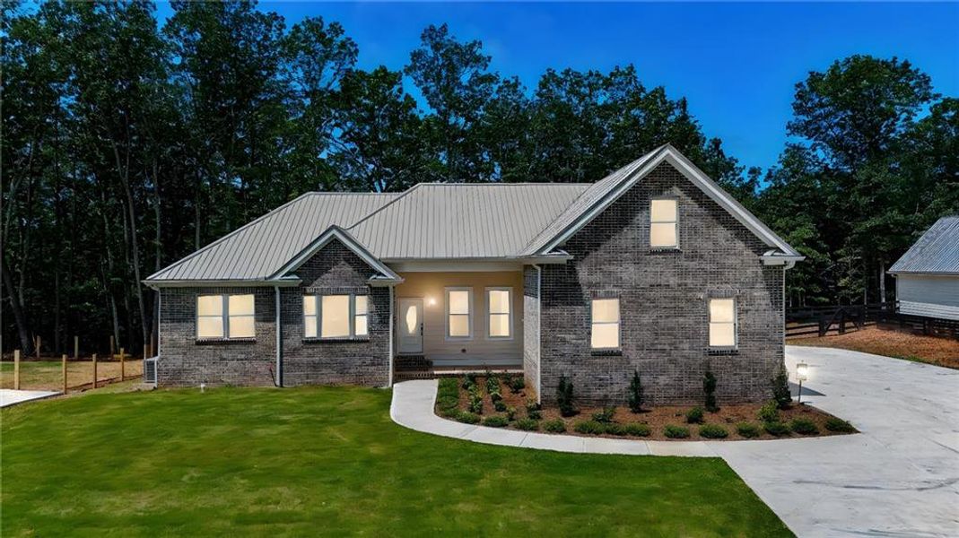 Front exterior of a new home in , Canton, GA, highlighting curb appeal (Image 28).