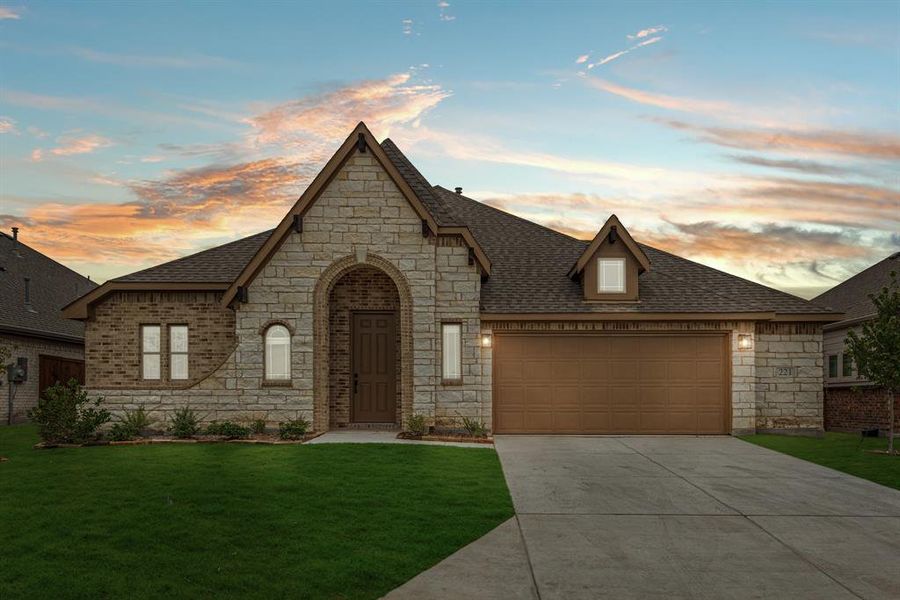 Front exterior of a new home in East Oak Creek 60-65, Commerce, TX, highlighting curb appeal (Image 2). Front exterior of a new home in East Oak Creek 60-65, Commerce, TX, highlighting curb appeal (Image 2).