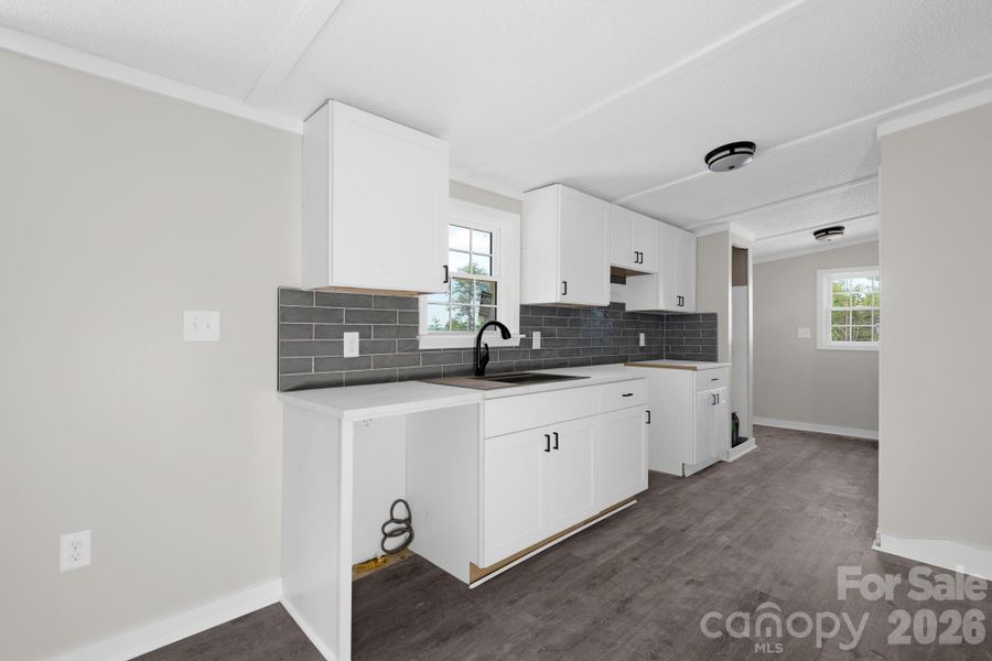 Furnished interior view inside a new home in , Vale (Image 3).