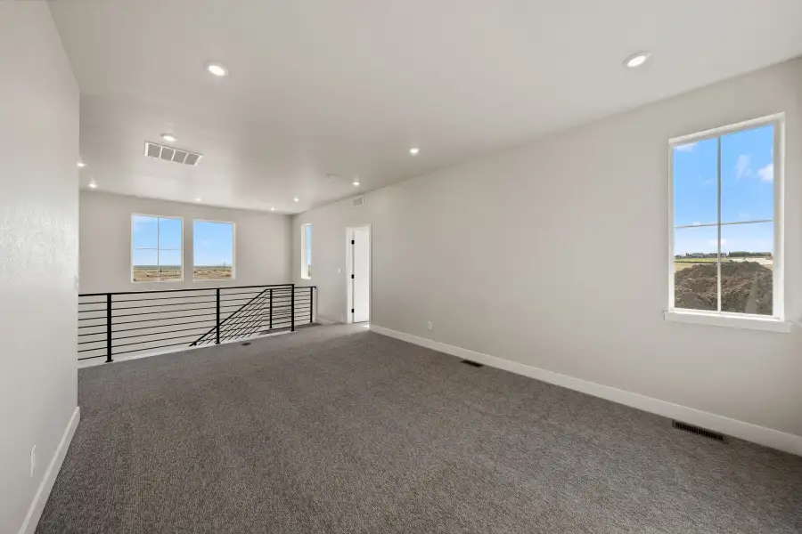 Spacious, unfurnished interior of a new home in Trumark Homes at Sterling Ranch, Littleton (Image 22).