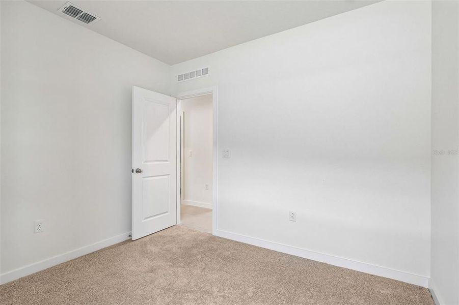 Spacious, unfurnished interior of a new home in Liberty Trace, Haines City (Image 21).