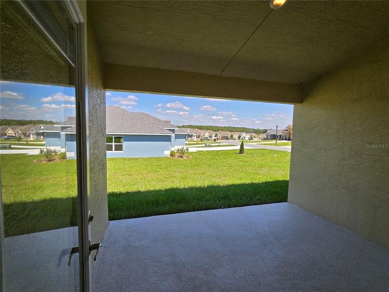 Exterior details and patio area of a home in Twisted Oaks, Beverly Hills (Image 17).