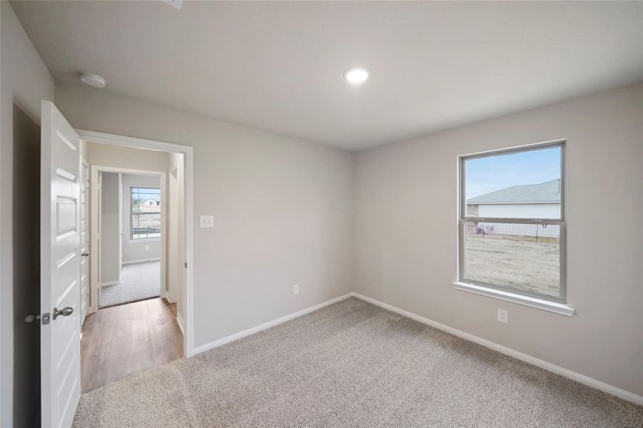 Spacious, unfurnished interior of a new home in Lexington Heights, Willis (Image 18).