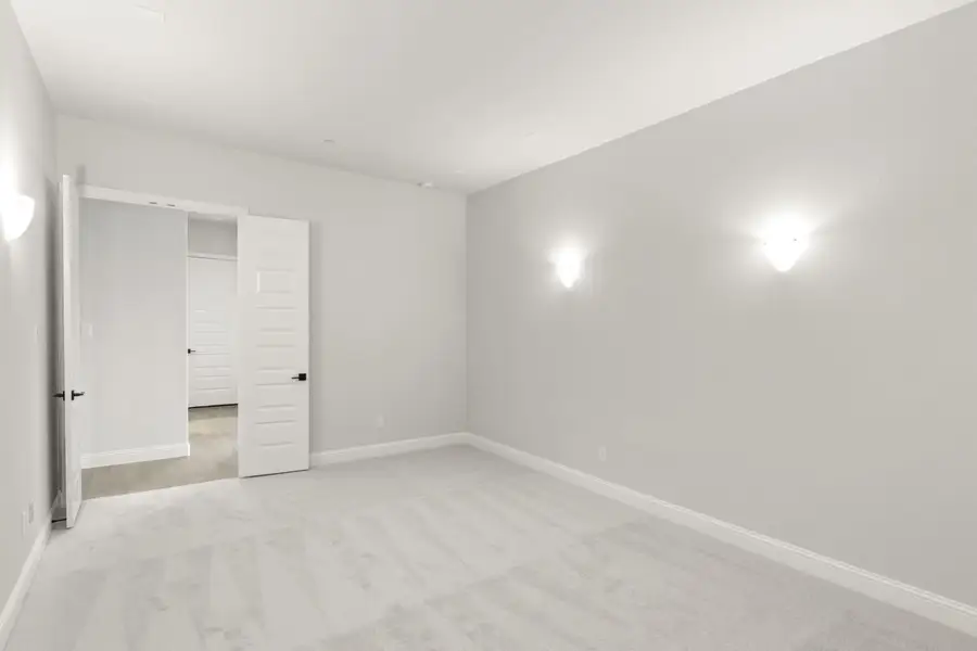 Representative unfurnished interior of a home built from the Southport by Windsor Homes in Ridge Pointe Estates, McLendon-Chisholm (Image 19).